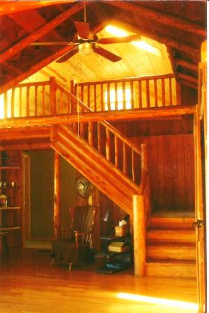 Photo of log cabin remodel by Sherman Construction, located in Remus Mi